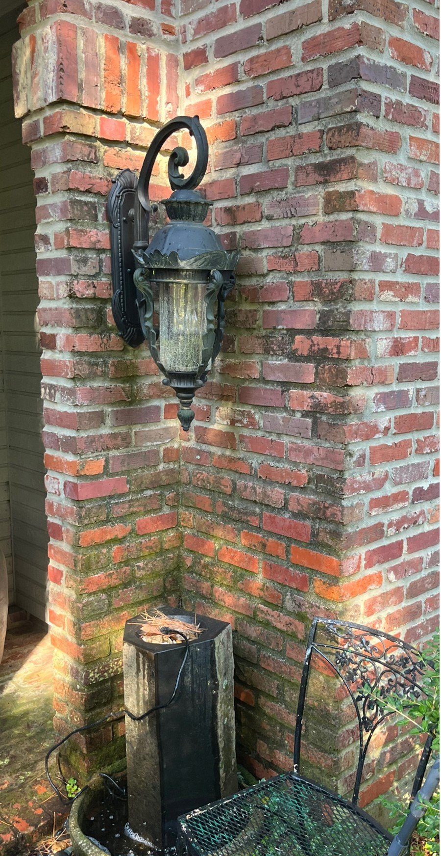 Before pressure washing - dirty building wall with mold