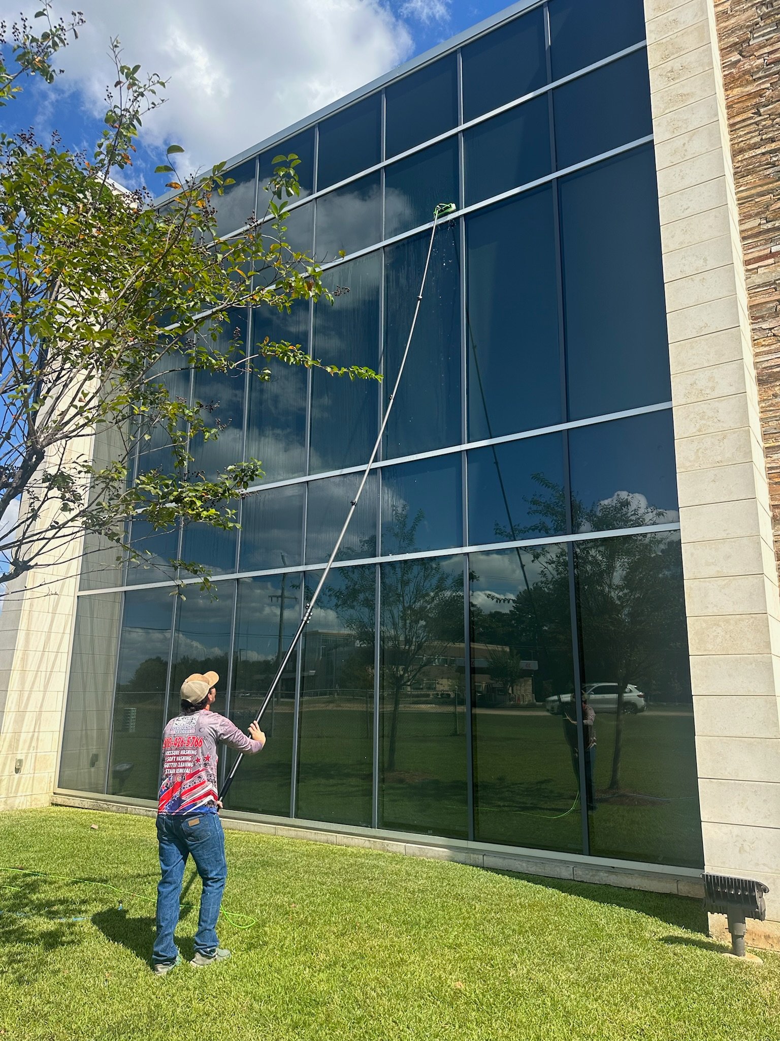 Commercial window and building exterior cleaning with water fed pole - Presidential Services Shreveport